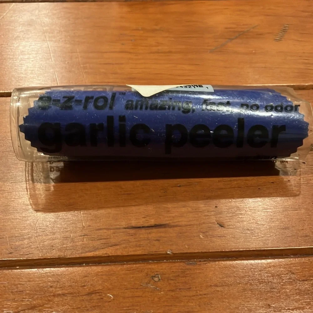 Gently Used Blue Silicone Garlic Peeler